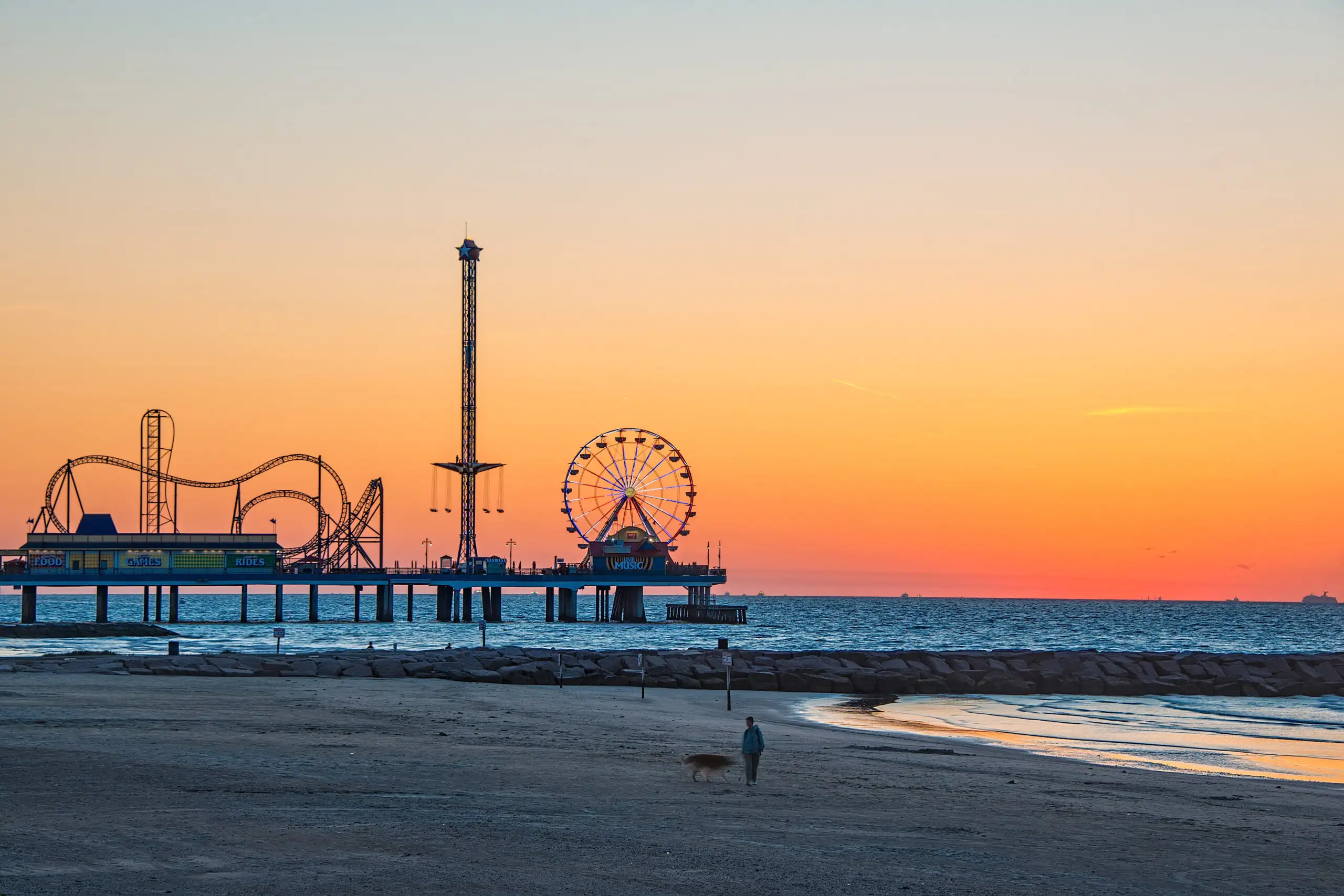 Amusement park rides on pier at Galveston, Texas