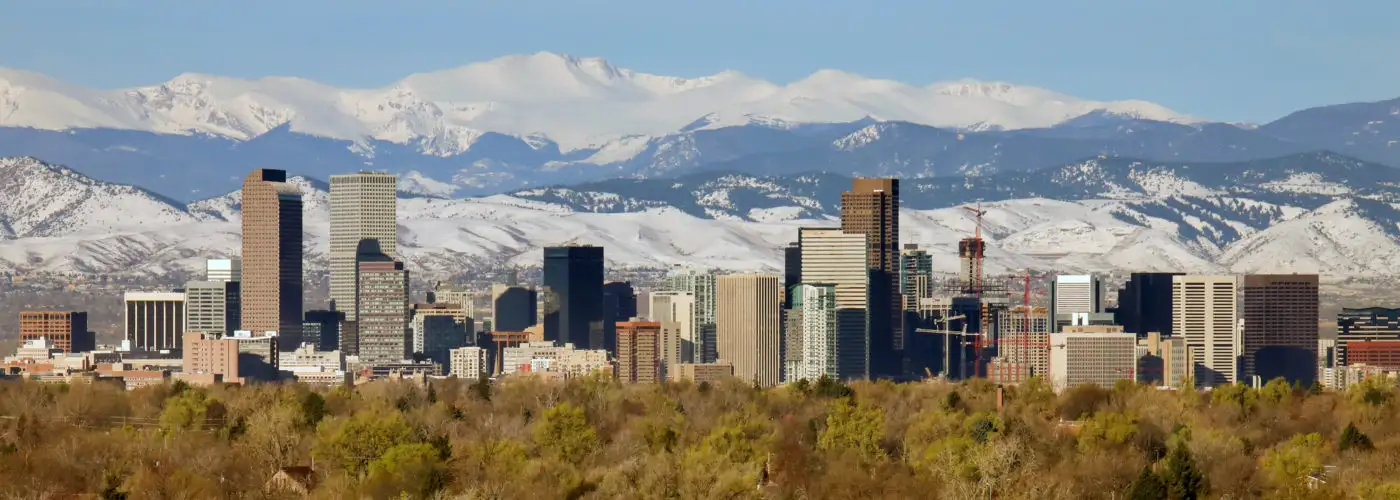 Denver, Colorado skyline with mountains in the background