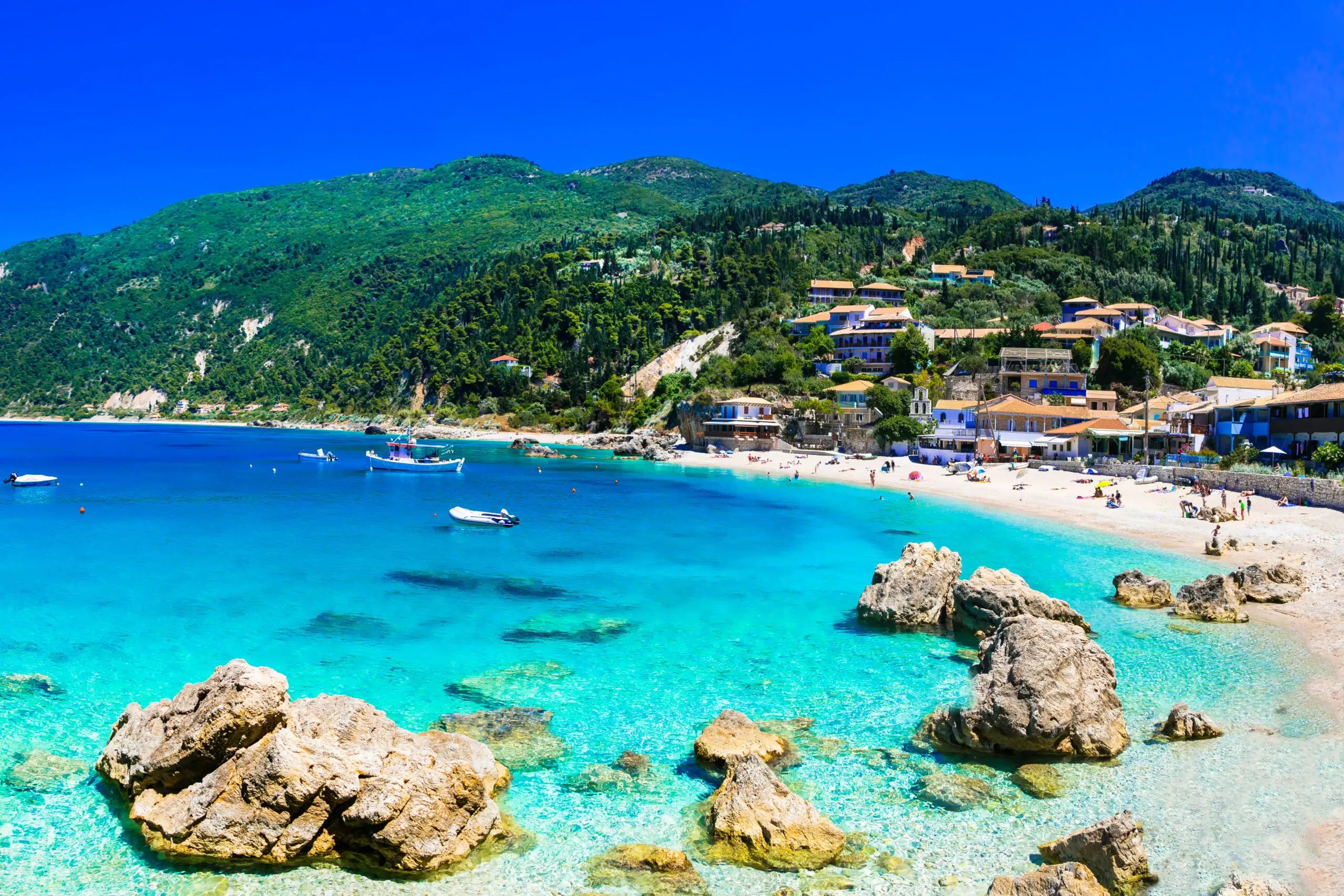 People enjoying the beach and coastline on the Greek island of Lefkada