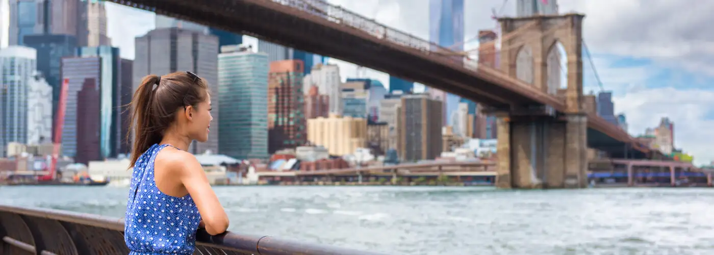 Woman looking over the New York City skyline