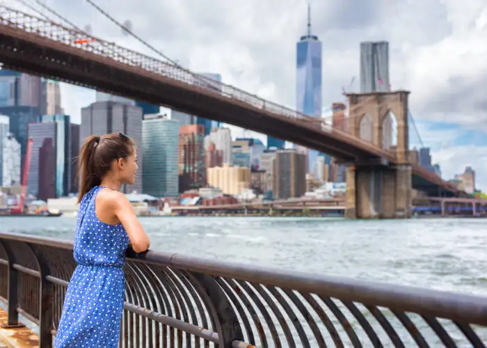 Woman looking over the New York City skyline