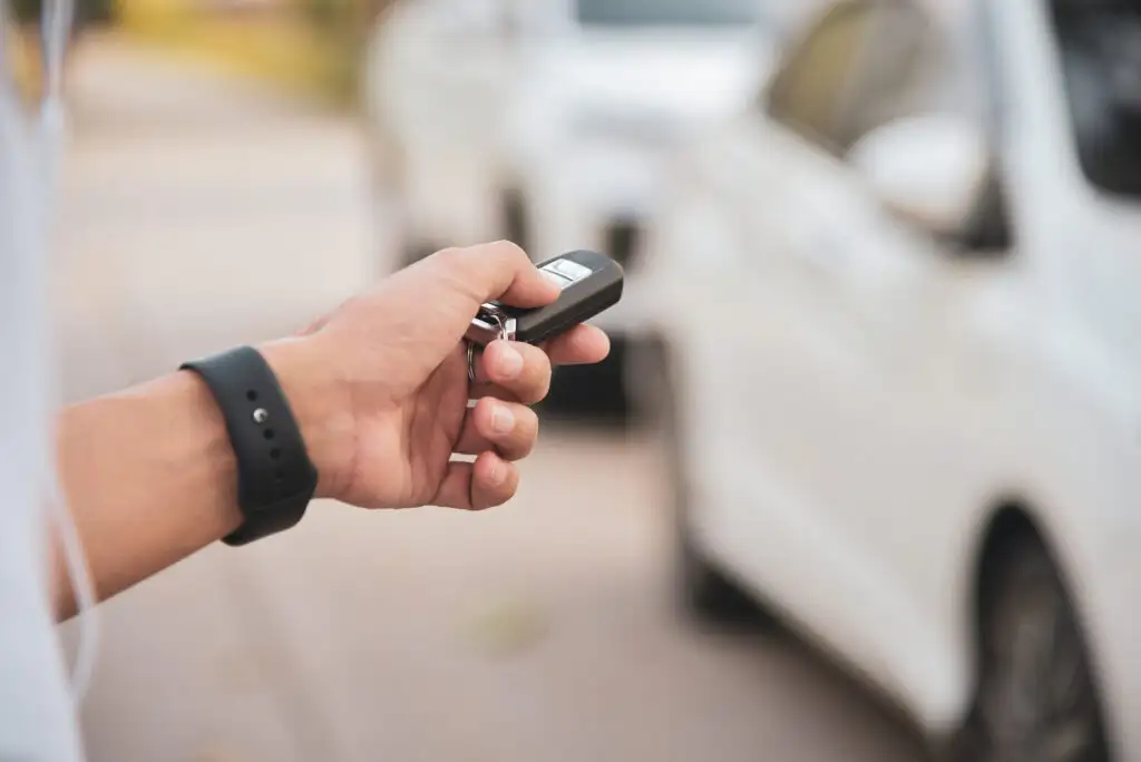 Close up of man's hand holding a car key