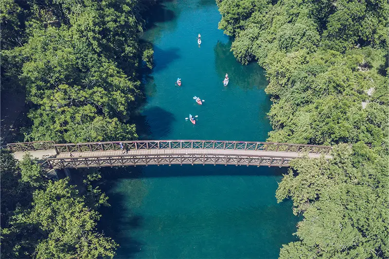 Aerial view of people kayaking on Barton Springs in Austin, Texas