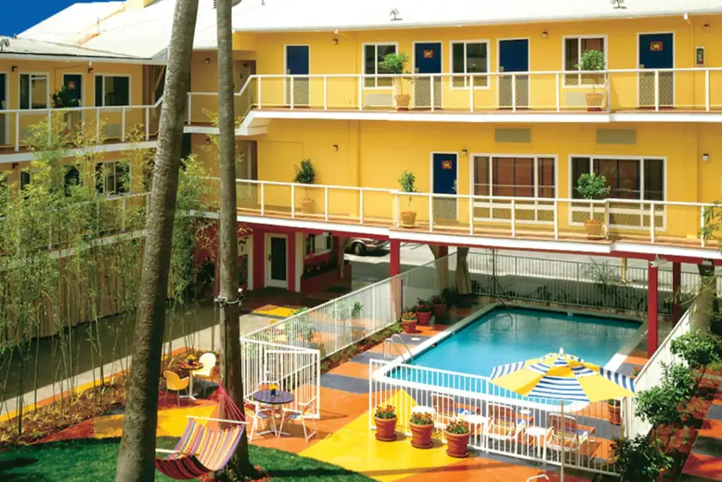 View of the pool area, hammock, and inner courtyard of the Hotel Del Sol