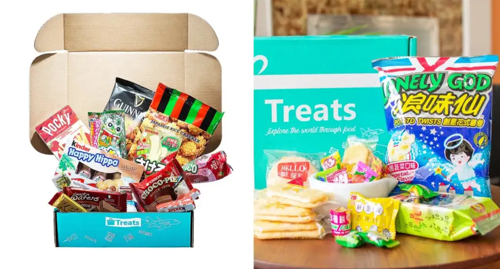 Various treats and snacks surrounding the packaging of the Treats snack subscription box