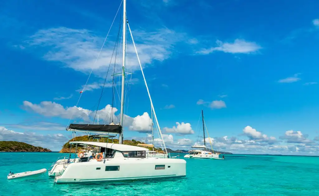 Turquoise colored sea with ancored catamarans, Tobago Cays, Saint Vincent and the Grenadines, Caribbean sea