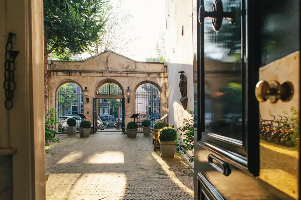 Looking through the front door of The Dylan Amsterdam at the street entrance