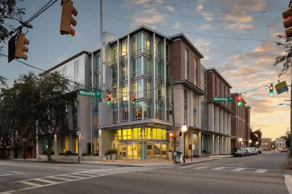 View from across the street of The Limited Hotel's exterior, loc ated in Charleston, SC