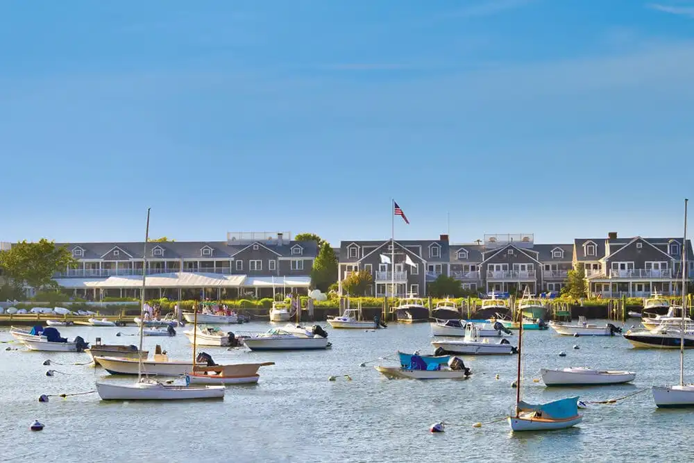 White Elephant hotel and adjacent harbor full of boat on Nantucket, Massachusetts